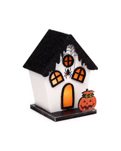 Halloween haunted house decoration with glowing orange windows, spider and pumpkin